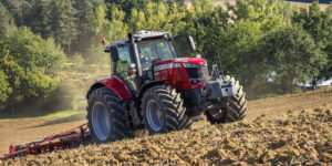massey ferguson 7700s series tractor tilling land